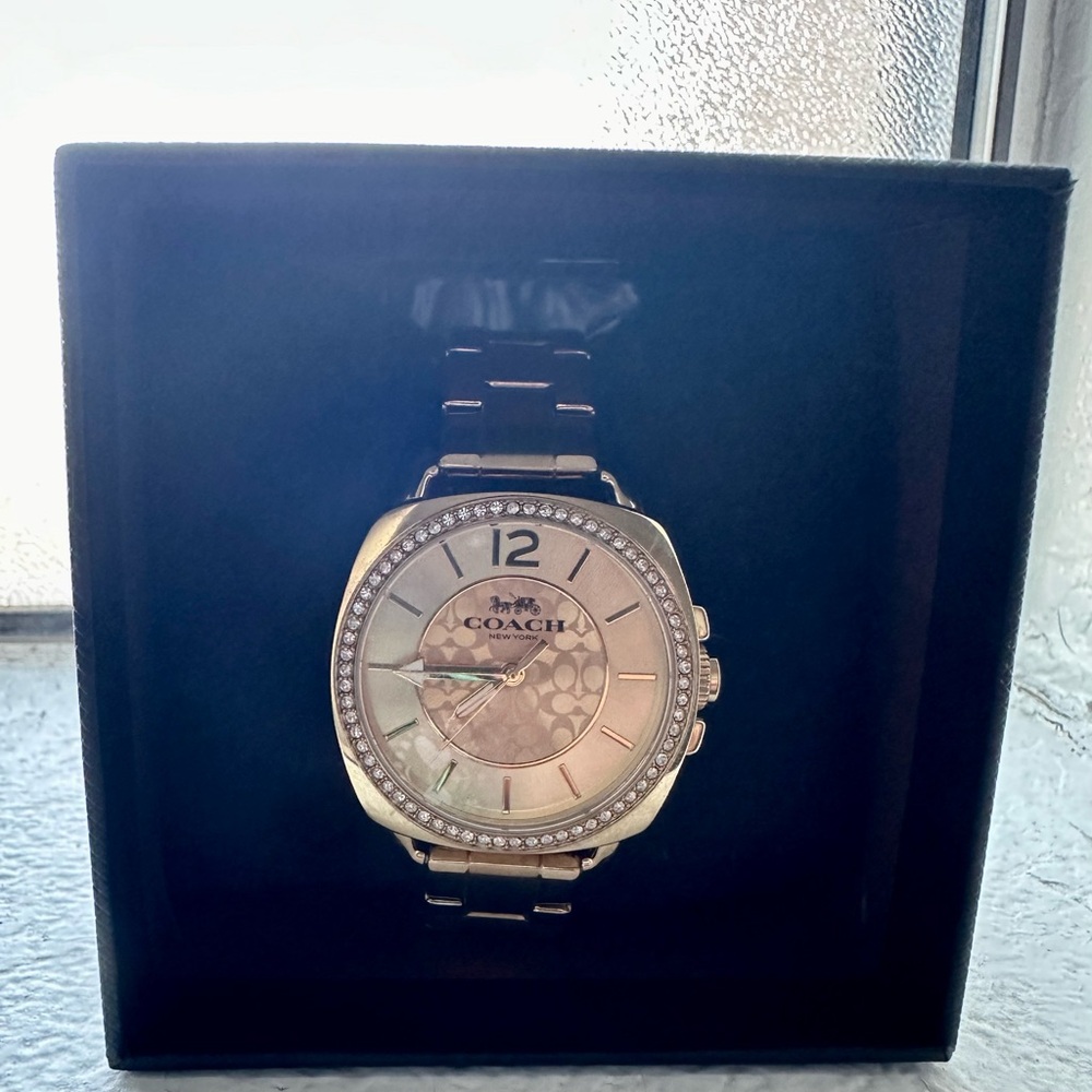 Gold Coach boyfriend watch.